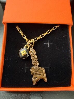 Louis Vuitton Upscale Gold-tone Key Charm Necklace with Black Enamel Logo Disc
